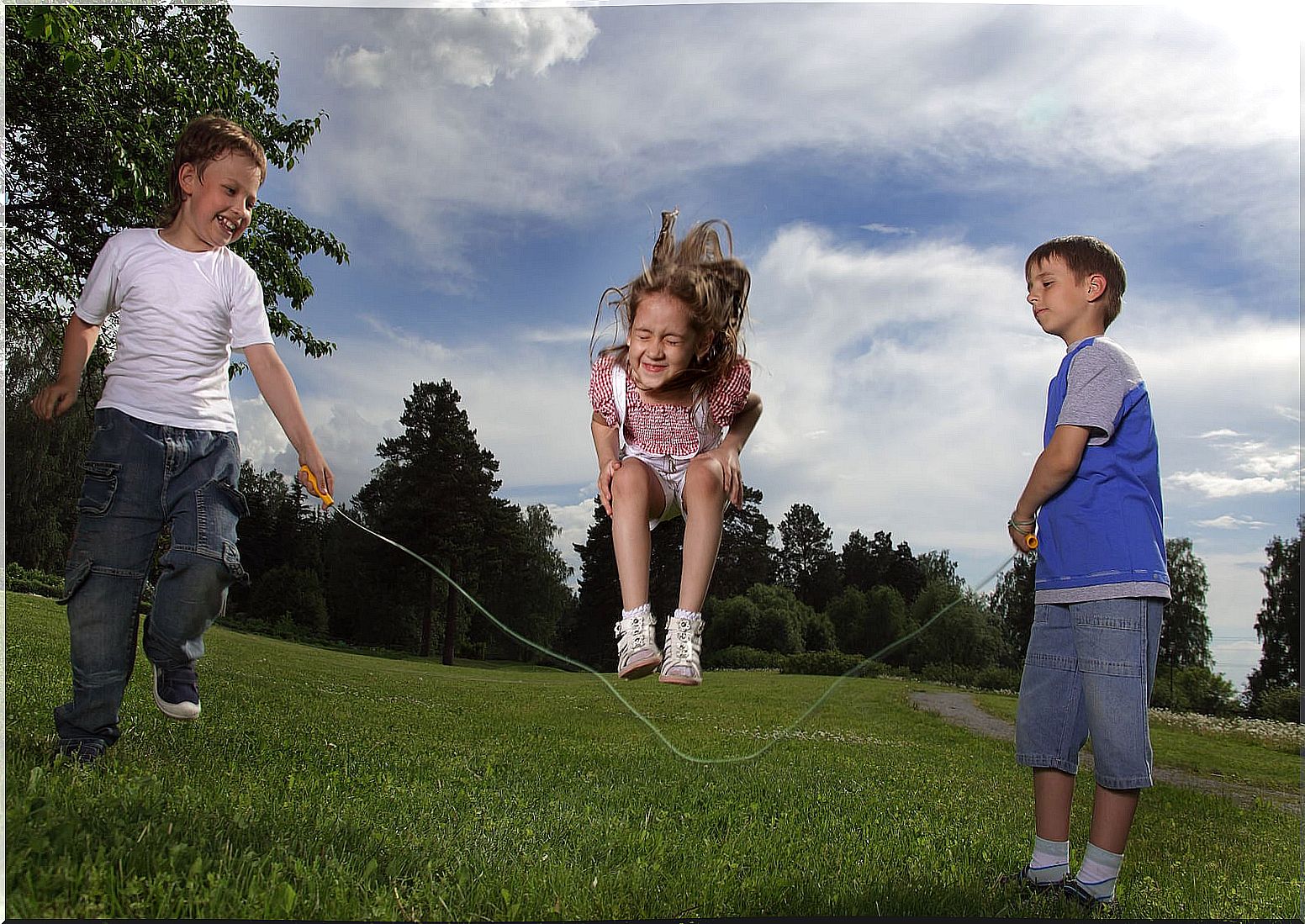 Kids jumping rope, one of the easiest free movement activities to do.