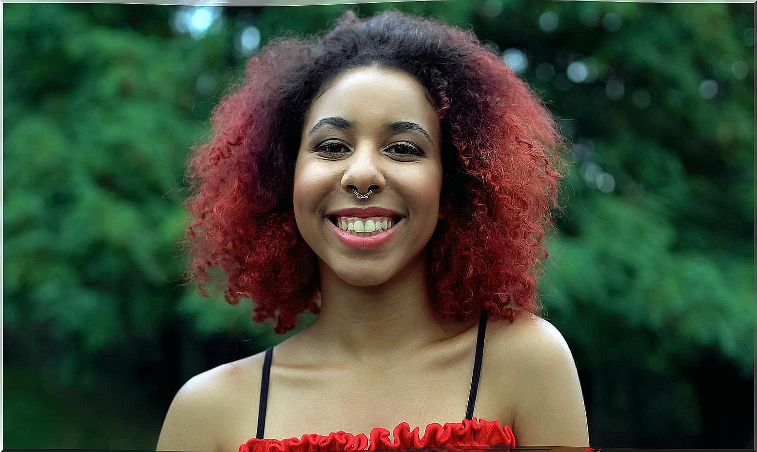 Teen girl with a piercing in her nose.