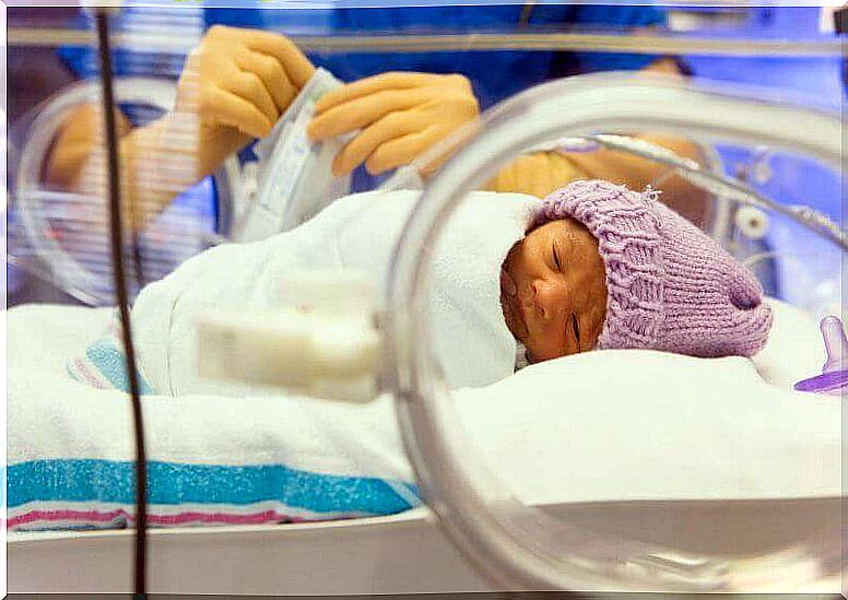 Baby in an incubator.