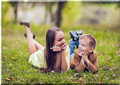 mother-lying-with-son-looking at each other