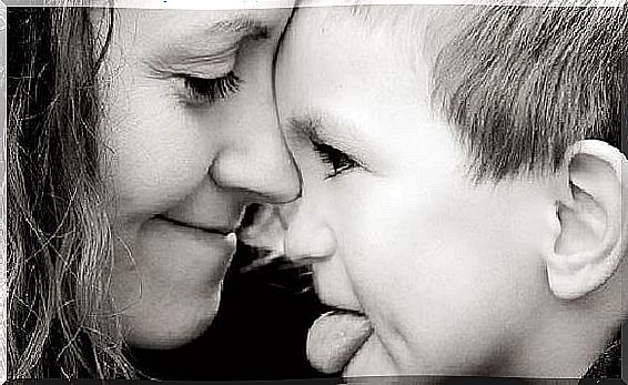 Mother and son looking at each other