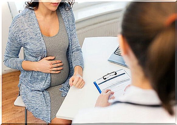 pregnant woman at doctor's office